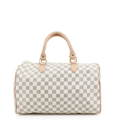 louis vuitton luggage checker.